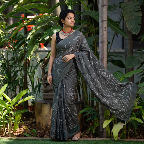 Grey Kutch tie-dye pure mul cotton rai Bandhani saree, draped and worn by a woman, AI visual of the saree, iTokri
