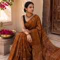 Brown Kutch tie-dye pure mul cotton rai Bandhani saree, draped and worn by a woman, AI visual of the saree, iTokri