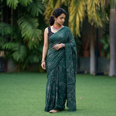 Green Kutch tie-dye pure mul cotton rai Bandhani saree, draped and worn by a woman, AI visual of the saree, iTokri