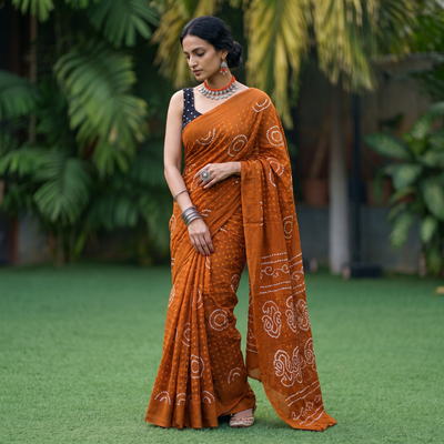 Orange Kutch tie-dye pure mul cotton rai Bandhani saree, draped and worn by a woman, AI visual of the saree, iTokri