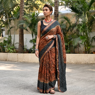 Brown and grey Kutch tie-dye Shibori Bandhani cotton saree, draped and worn by a woman, by artisan Shabana Khatri, AI visual of the saree, iTokri