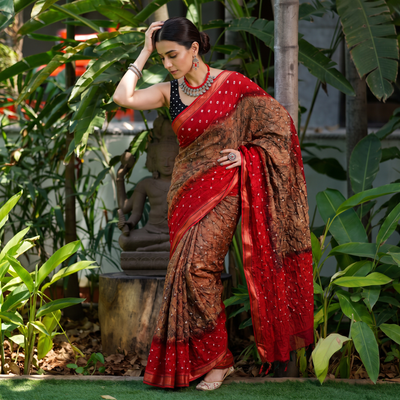 Brown and red Kutch tie-dye Shibori Bandhani cotton saree, draped and worn by a woman, by artisan Shabana Khatri, AI visual of the saree, iTokri