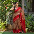 Brown and red Kutch tie-dye Shibori Bandhani cotton saree, draped and worn by a woman, by artisan Shabana Khatri, AI visual of the saree, iTokri