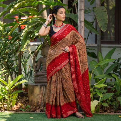 Brown and red Kutch tie-dye Shibori Bandhani cotton saree, draped and worn by a woman, by artisan Shabana Khatri, AI visual of the saree, iTokri