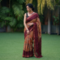 Brown and maroon Kutch tie-dye Shibori Bandhani cotton saree, draped and worn by a woman, by artisan Shabana Khatri, AI visual of the saree, iTokri
