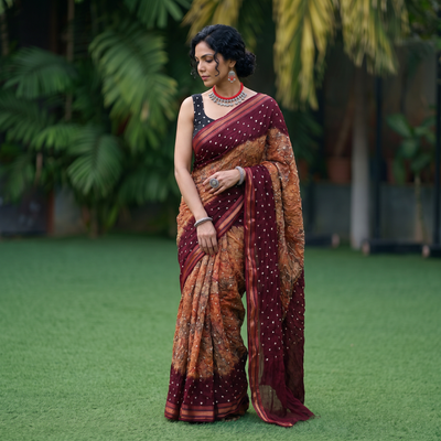Brown and maroon Kutch tie-dye Shibori Bandhani cotton saree, draped and worn by a woman, by artisan Shabana Khatri, AI visual of the saree, iTokri