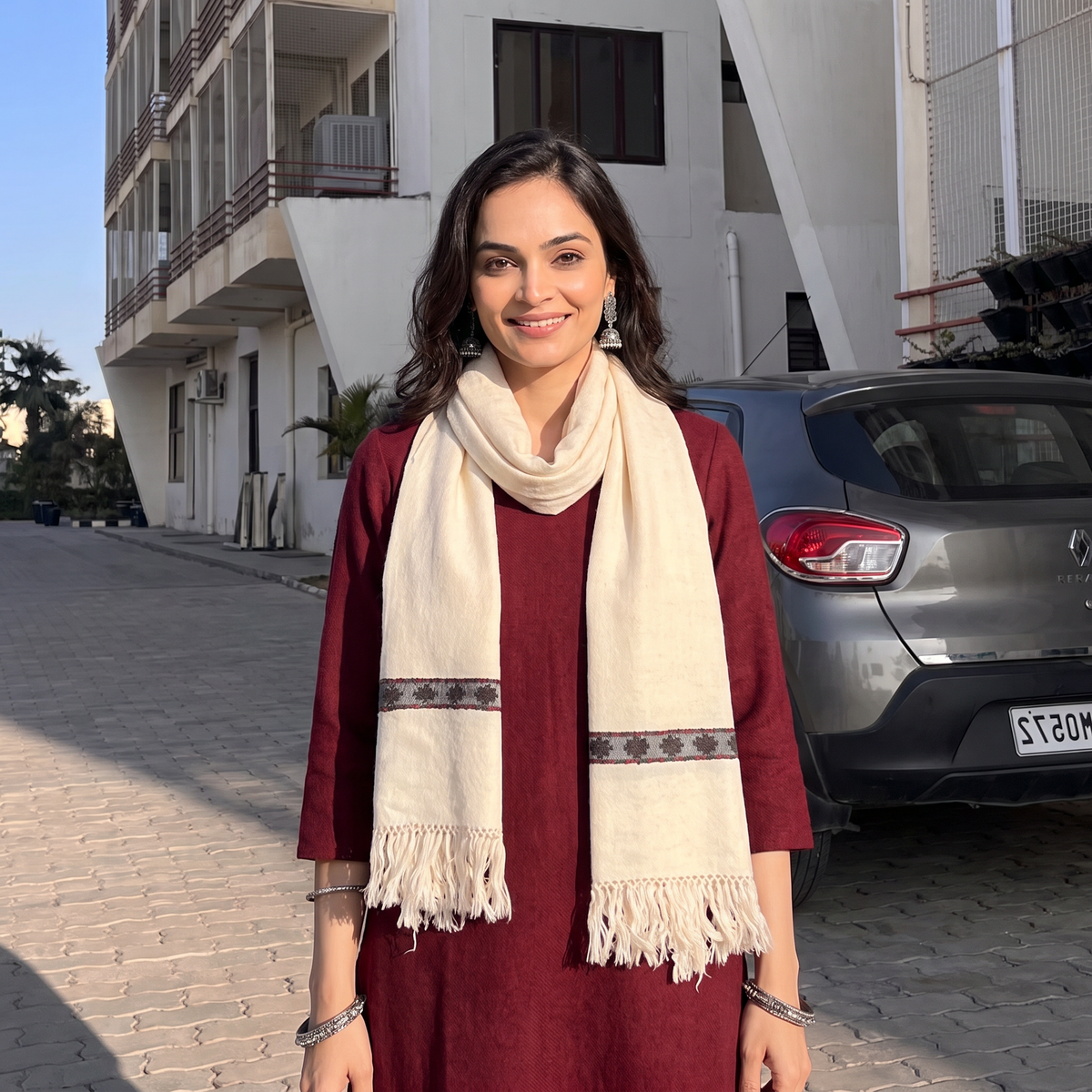 White Ladakh Pure Handwoven Sheep Merino Wool Stole, worn by a woman, AI visual of the stole, iTokri