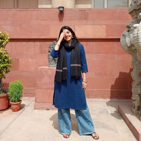 Black Ladakh Pure Handwoven Sheep Merino Wool Stole, worn by a woman, AI visual of the stole, iTokri