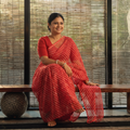 Red Leheriya Tie-Dye Kota Doria Cotton Saree, draped and worn by a woman, AI visual of the saree, iTokri