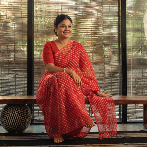 Red Leheriya Tie-Dye Kota Doria Cotton Saree, draped and worn by a woman, AI visual of the saree, iTokri