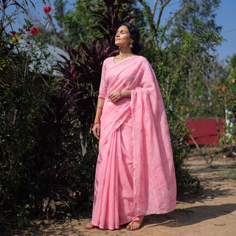 Pink Lucknow Chikankari Hand Embroidery Terivoile Cotton Saree, draped and worn by a woman, AI visual of the saree, iTokri