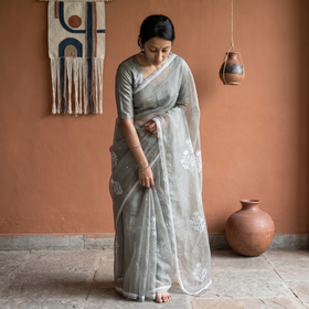 Grey Lucknowi Chikankari Heavy Bead Work Pure Organza Silk Saree, draped and worn by a woman, AI visual of the saree, iTokri