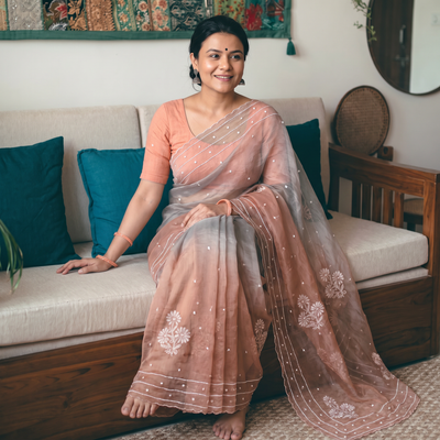 Pink Lucknowi Chikankari Heavy Bead Work Pure Organza Silk Saree, draped and worn by a woman, AI visual of the saree, iTokri