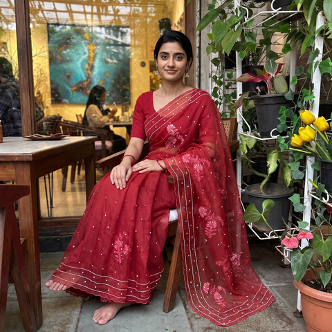 Red Lucknowi Chikankari Heavy Bead Work Pure Organza Silk Saree, draped and worn by a woman, AI visual of the saree, iTokri