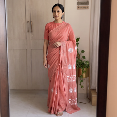 Orange Lucknowi Chikankari Heavy Mukaish Work Pure Mul Chanderi Saree, draped and worn by a woman, AI visual of the saree, iTokri