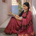 Pink Maheshwari Silk Natural Dyed Bagh Hand Block Print Saree with Zari Border, draped and worn by a woman, AI visual of the saree, iTokri