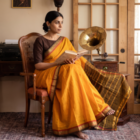 Orange Mangalagiri Godavari Handloom Cotton Zari Border Saree, draped and worn by a woman, AI visual of the saree, iTokri
