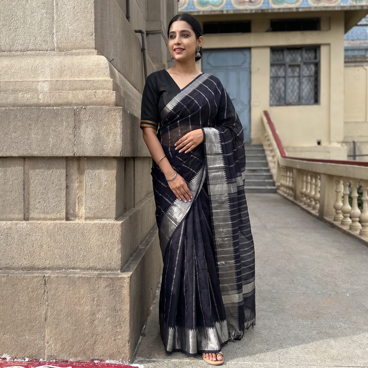Black Mangalagiri Handloom Silk Cotton Saree with Zari Border, draped and worn by a woman, AI visual of the saree, iTokri