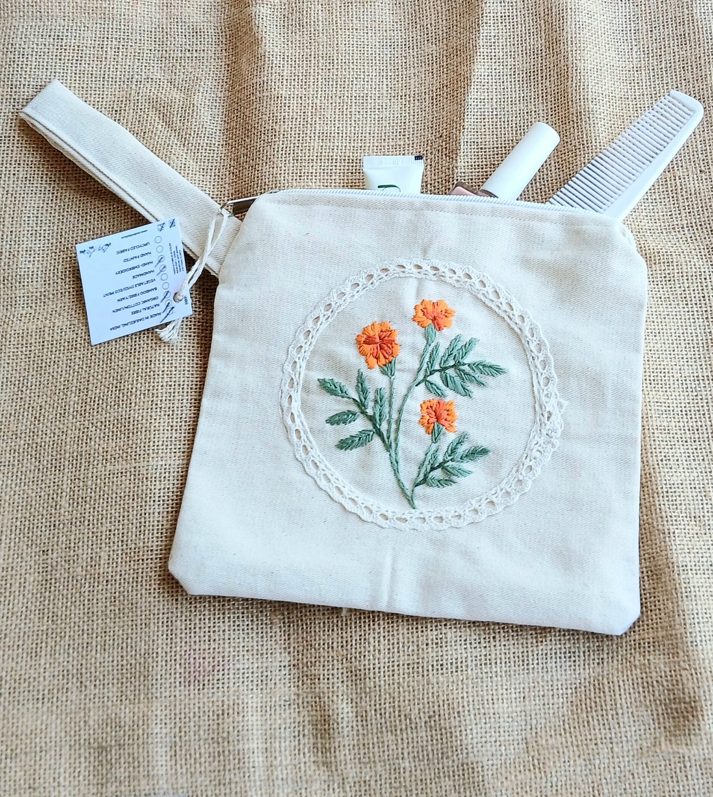 Marigold garden hand embroidered utility pouch - handcrafted
