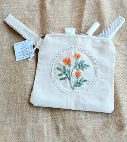 Marigold garden hand embroidered utility pouch - handcrafted