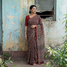 Black Maroon Bagru Hand Block Print Kota Doria Cotton Saree, draped and worn by a woman, AI visual of the saree, iTokri