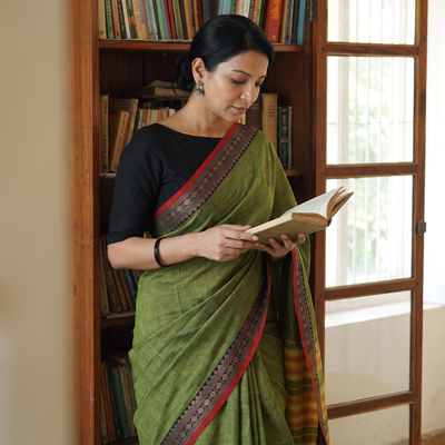 Green Mercerised Cotton Dharwad Saree with Thread Border, draped and worn by a woman, AI visual of the saree, iTokri