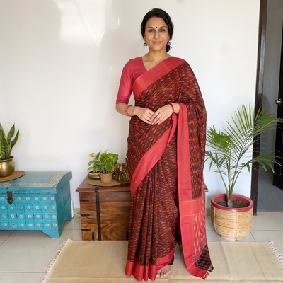 Maroon Mercerised Cotton Handloom Pochampally Ikat Saree, draped and worn by a woman, AI visual of the saree, iTokri