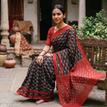Brown Mercerised Cotton Handloom Pochampally Ikat Saree, draped and worn by a woman, AI visual of the saree, iTokri