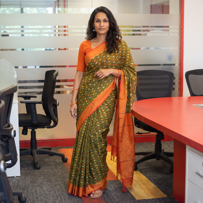 Green Mercerised Cotton Handloom Pochampally Ikat Saree, draped and worn by a woman, AI visual of the saree, iTokri