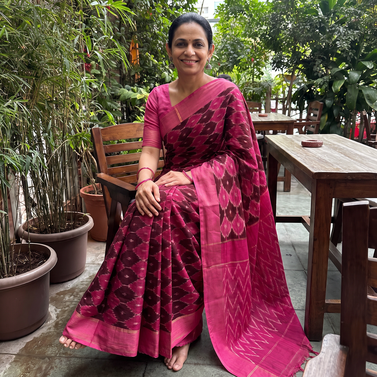 Pink Mercerised Cotton Handloom Pochampally Ikat Saree, draped and worn by a woman, AI visual of the saree, iTokri