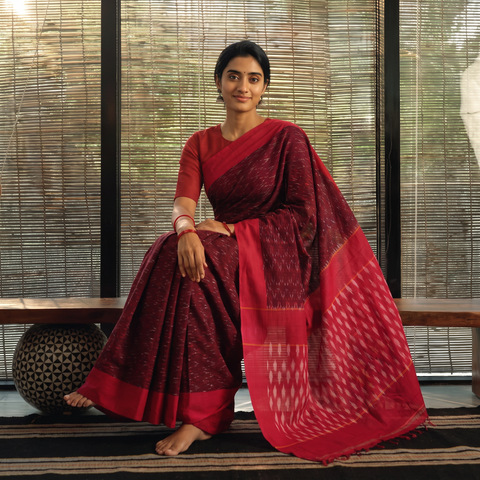 Maroon Mercerised Cotton Handloom Pochampally Ikat Saree, draped and worn by a woman, AI visual of the saree, iTokri