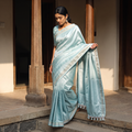 Blue Mercerised Cotton Silk Khun Saree with Blouse Piece, draped and worn by a woman, AI visual of the saree, iTokri