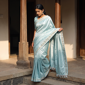 Blue Mercerised Cotton Silk Khun Saree with Blouse Piece, draped and worn by a woman, AI visual of the saree, iTokri