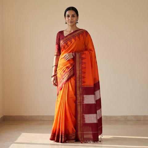 Orange Mercerized Cotton Ilkal Saree With Blouse, draped and worn by a woman, AI visual of the saree, iTokri