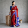 Red Mercerized Cotton Ilkal Saree with Border, draped and worn by a woman, AI visual of the saree, iTokri
