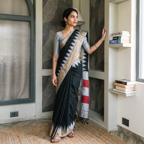 Black Mercerized Cotton Plain Saree with Border, draped and worn by a woman, AI visual of the saree, iTokri