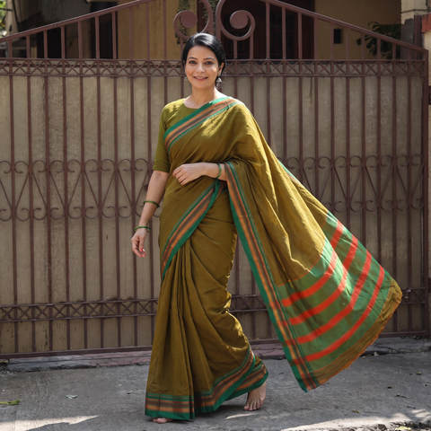 Brown Mercerized Cotton Plain Saree with Border, draped and worn by a woman, AI visual of the saree, iTokri