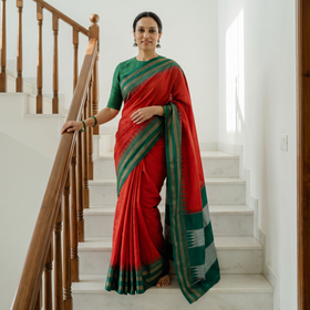 Red Mercerized Cotton Plain Saree with Rudraksha Border, draped and worn by a woman, AI visual of the saree, iTokri