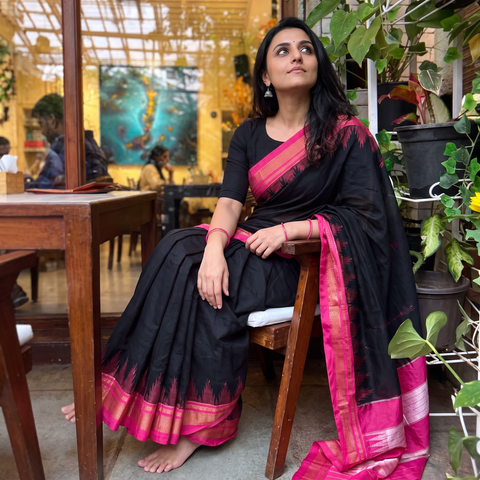 Black Mercerized Cotton Saree with Temple Zari Border, draped and worn by a woman, AI visual of the saree, iTokri