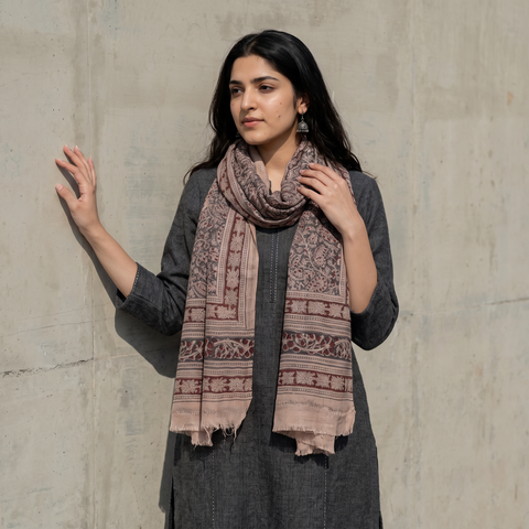 Light pink Merino Wool Stole in Pedana Kalamkari Block Prints, worn by a woman, AI visual of the stole, iTokri