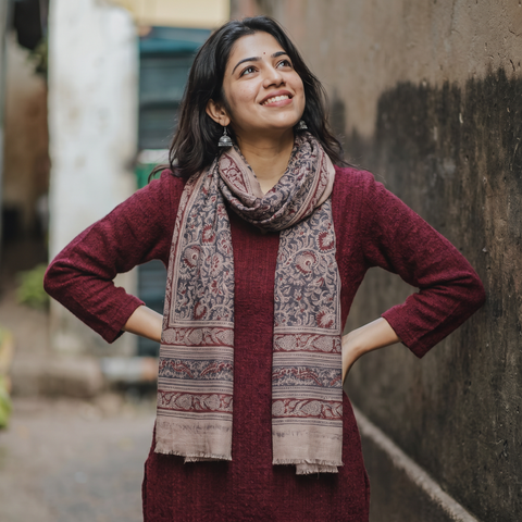 Light pink Merino Wool Stole in Pedana Kalamkari Block Prints, worn by a woman, AI visual of the stole, iTokri