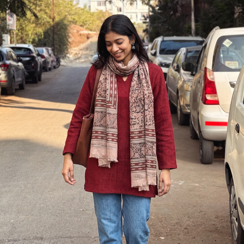 Light pink Merino Wool Stole in Pedana Kalamkari Block Prints, worn by a woman, AI visual of the stole, iTokri