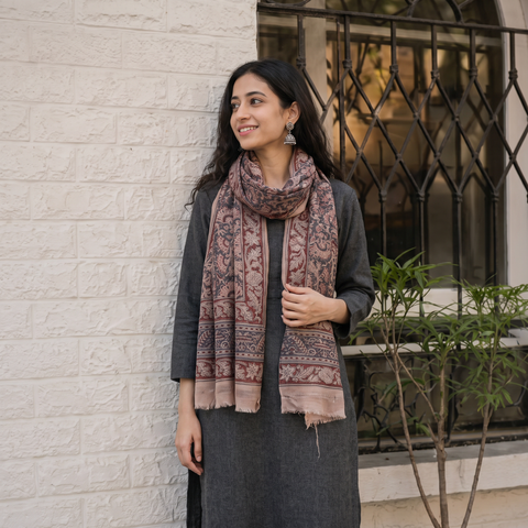 Light pink Merino Wool Stole in Pedana Kalamkari Block Prints, worn by a woman, AI visual of the stole, iTokri