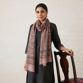 Light pink Merino Wool Stole in Pedana Kalamkari Block Prints, worn by a woman, AI visual of the stole, iTokri