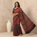 Red Modal Silk Block Print Ajrakh Saree, draped and worn by a woman, AI visual of the saree, iTokri