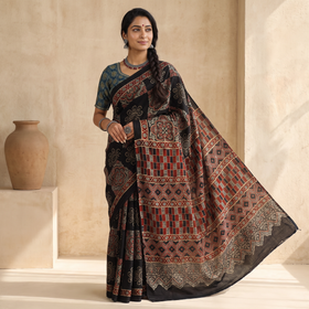 Multicolor Modal Silk Block Print Ajrakh Saree, draped and worn by a woman, AI visual of the saree, iTokri