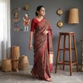 Red Modal Silk Block Printed Ajrakh Saree with Zari Border, draped and worn by a woman, AI visual of the saree, iTokri