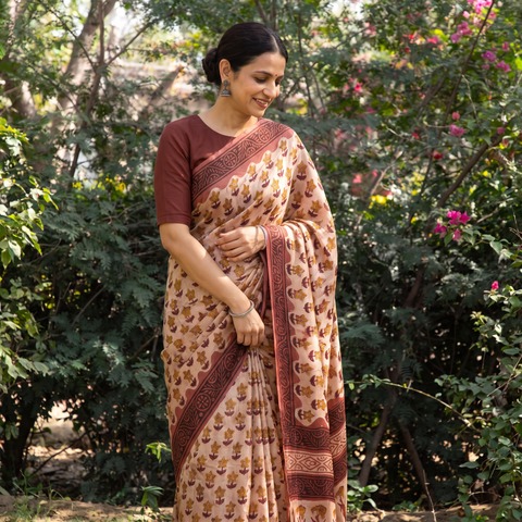 Pink Modal Silk Hand Block Print Bagru Saree, draped and worn by a woman, AI visual of the saree, iTokri