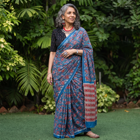Blue Modal Silk Hand Block Sanganeri Print Saree, draped and worn by a woman, AI visual of the saree, iTokri