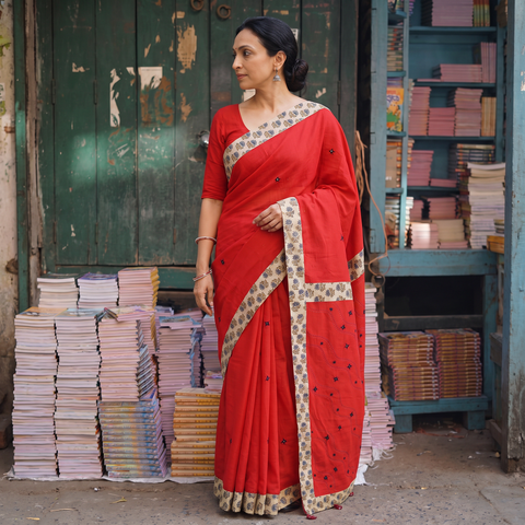 Red Mul Cotton Ajrakh Patchwork Saree with Tagai Mirror Work, draped and worn by a woman, AI visual of the saree, iTokri
